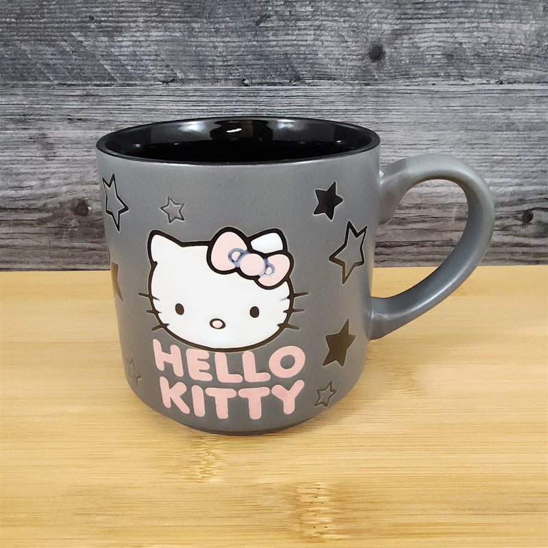 Load image into Gallery viewer, Hello Kitty Coffee Mug Black Stars Embossed by Blue Sky Ceramic Pink & Black Cup