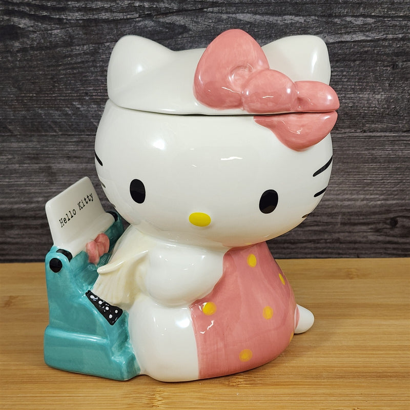 Load image into Gallery viewer, Hello Kitty Retro Typewriter Cookie Snack Jar Classic Ceramic Blue Sky Embossed