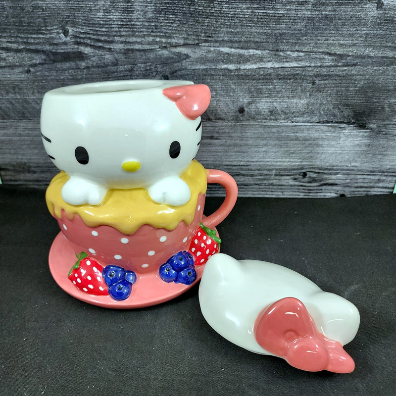 Load image into Gallery viewer, Hello Kitty Sweet Tea Cup Cookie Snack Jar Ceramic Blue Sky Embossed