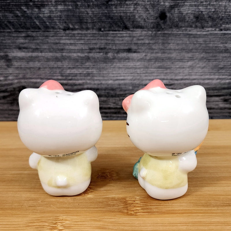 Load image into Gallery viewer, Hello Kitty Flower Gardening Salt Pepper Set Collectible Ceramic by Blue Sky