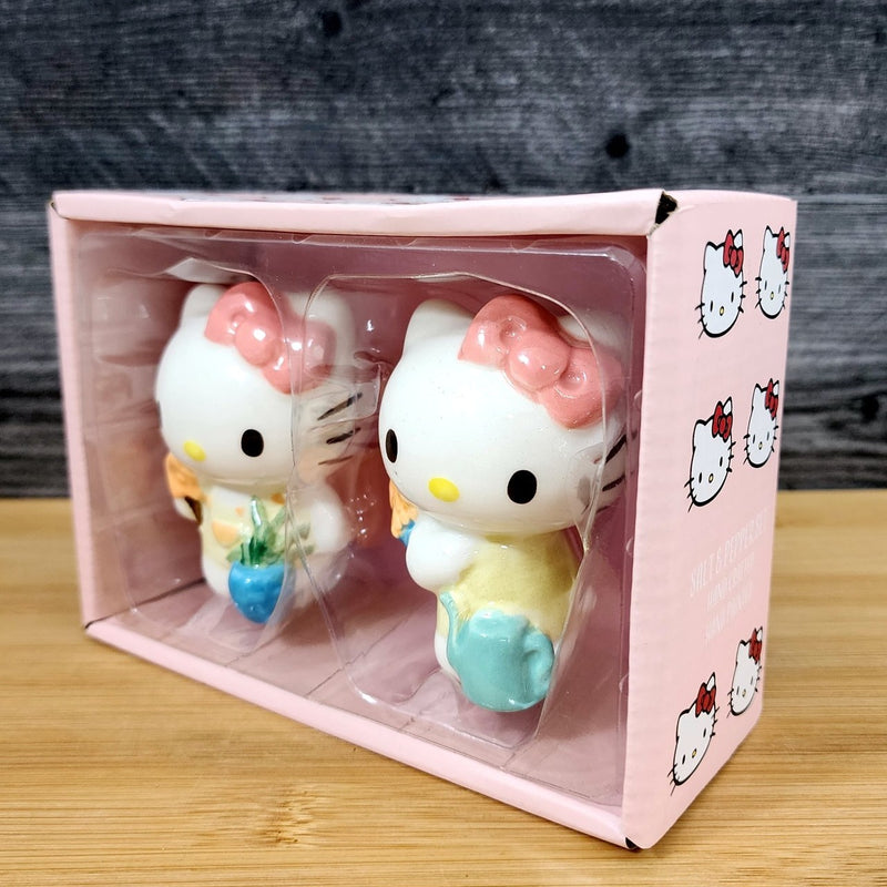 Load image into Gallery viewer, Hello Kitty Flower Gardening Salt Pepper Set Collectible Ceramic by Blue Sky