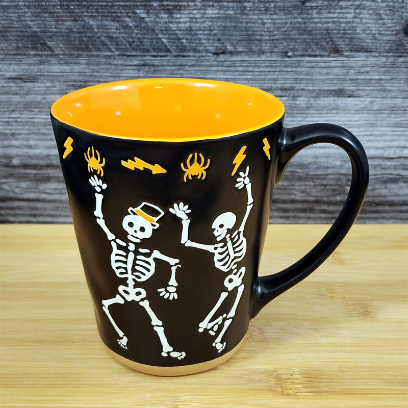 Load image into Gallery viewer, Halloween Dancing Skeleton Bones Orange Coffee Mug Ceramic Tea Cup Blue Sky