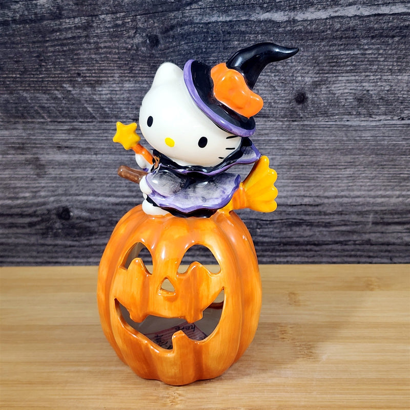 Load image into Gallery viewer, Hello Kitty Halloween Witch Tealight Candle House Ceramic Pumpkin Blue Sky