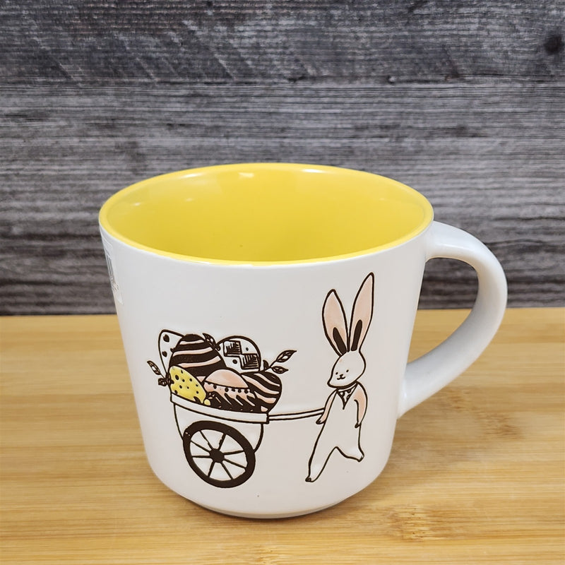 Load image into Gallery viewer, Easter Basket Coffee Mug Bunny and Cart Ceramic Tea Cup Yellow Blue Sky 14oz