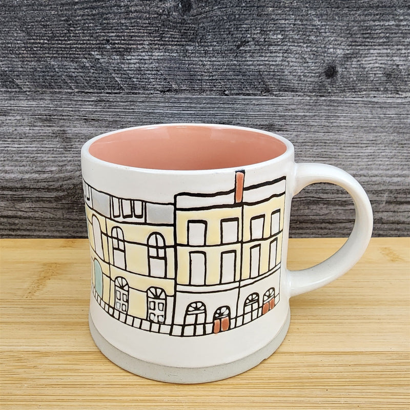 Load image into Gallery viewer, Whimsical Cityscape Coffee Mug Pastel Design Pink Interior Pottery Cup Blue Sky