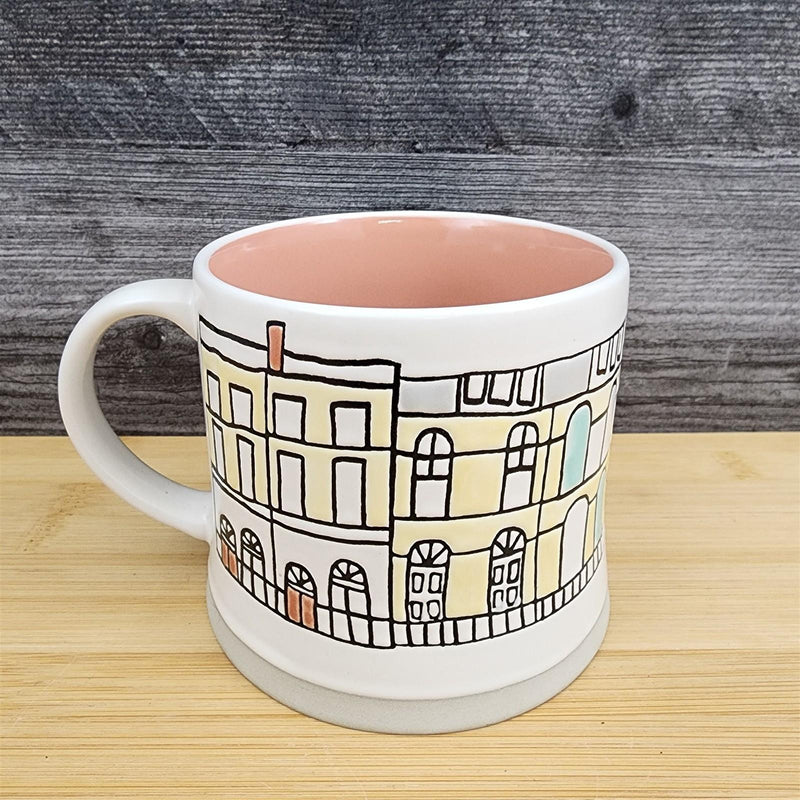 Load image into Gallery viewer, Whimsical Cityscape Coffee Mug Pastel Design Pink Interior Pottery Cup Blue Sky