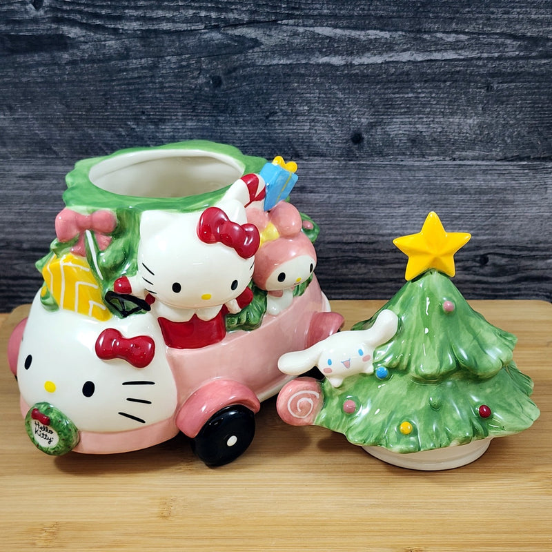 Load image into Gallery viewer, Hello Kitty My Melody Cookie Jar Joy Ride Car Christmas Tree Blue Sky Ceramic
