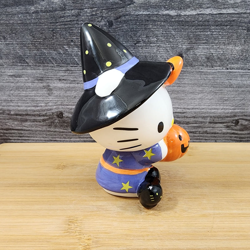 Load image into Gallery viewer, Hello Kitty in Halloween Costumes Witch Pumpkin Figurine Décor Ceramic Blue Sky