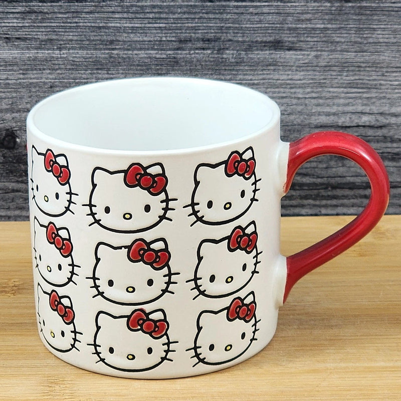 Load image into Gallery viewer, Hello Kitty Faces Coffee Mug Red Ceramic Tea Cup Blue Sky Embossed 18oz
