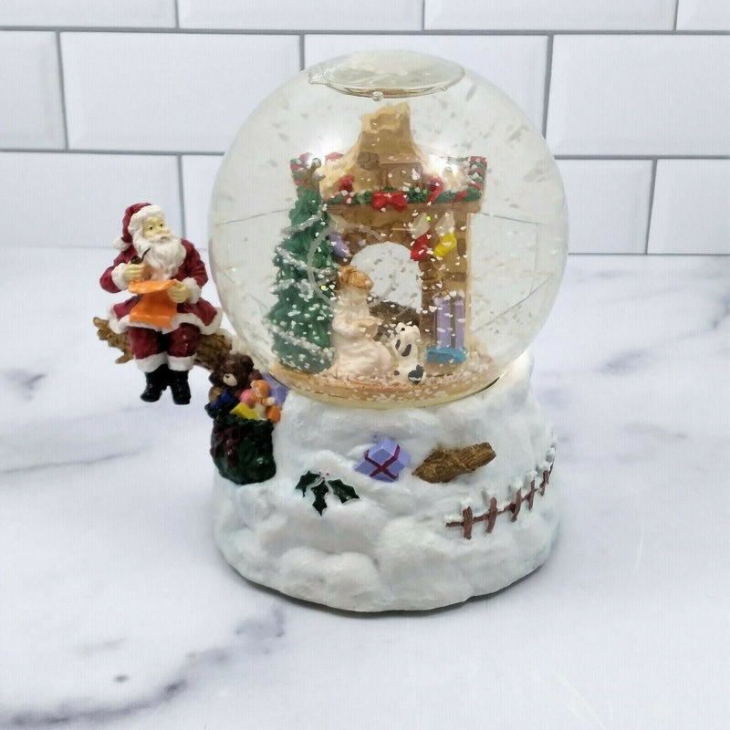 Load image into Gallery viewer, Santa World Snow Globe Musical