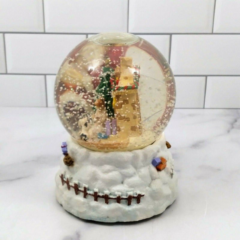 Load image into Gallery viewer, Santa World Snow Globe Musical