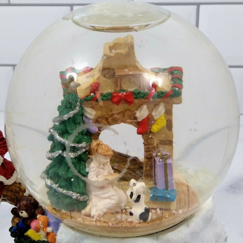 Load image into Gallery viewer, Santa World Snow Globe Musical