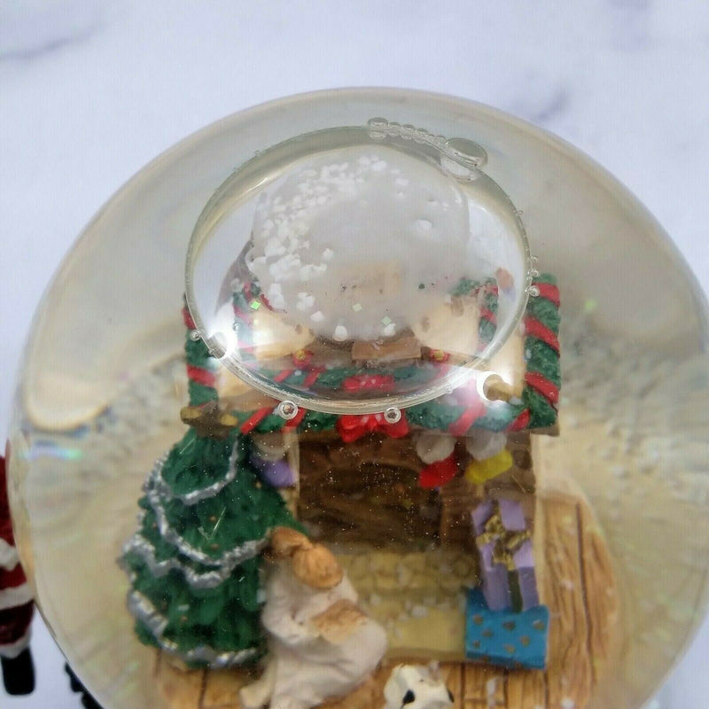 Load image into Gallery viewer, Santa World Snow Globe Musical