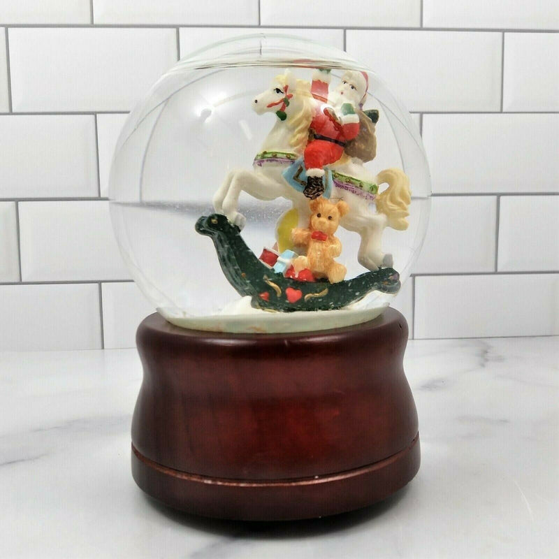 Load image into Gallery viewer, Santa on Rocking Horse Animated Music Box Snow Globe