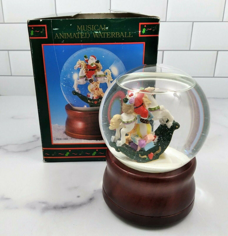 Load image into Gallery viewer, Santa on Rocking Horse Animated Music Box Snow Globe