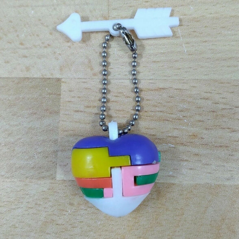 Load image into Gallery viewer, Heart Plastic Keychain Puzzle Vending Charm Gumball Machine 1960'S