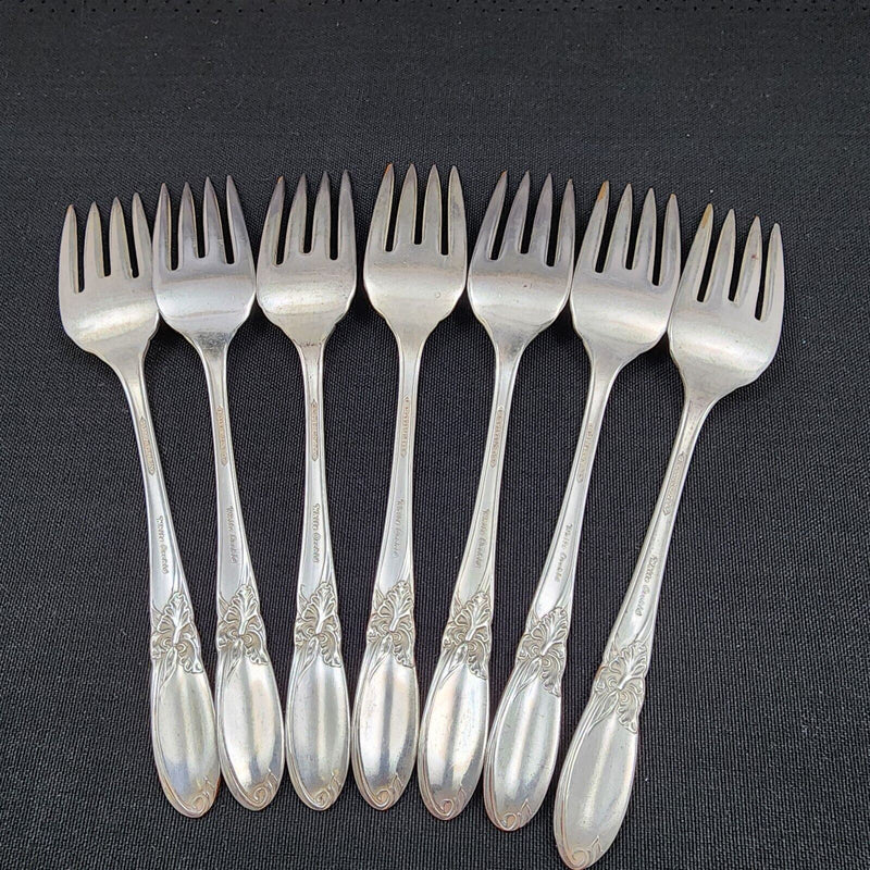 Load image into Gallery viewer, Oneida Community 1953 White Orchid Set Of 7 Silverplated Salad Forks