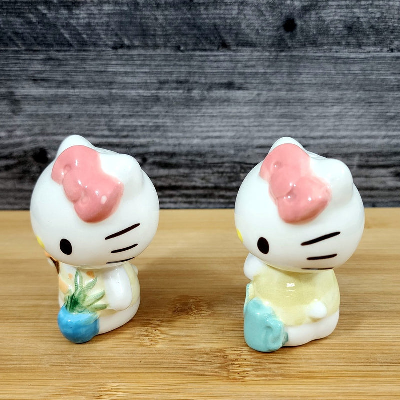 Load image into Gallery viewer, Hello Kitty Flower Gardening Salt Pepper Set Collectible Ceramic by Blue Sky
