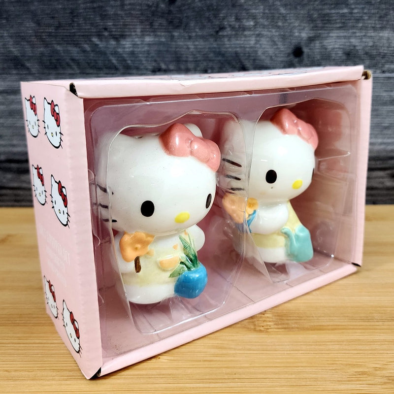 Load image into Gallery viewer, Hello Kitty Flower Gardening Salt Pepper Set Collectible Ceramic by Blue Sky
