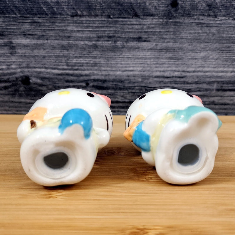 Load image into Gallery viewer, Hello Kitty Flower Gardening Salt Pepper Set Collectible Ceramic by Blue Sky
