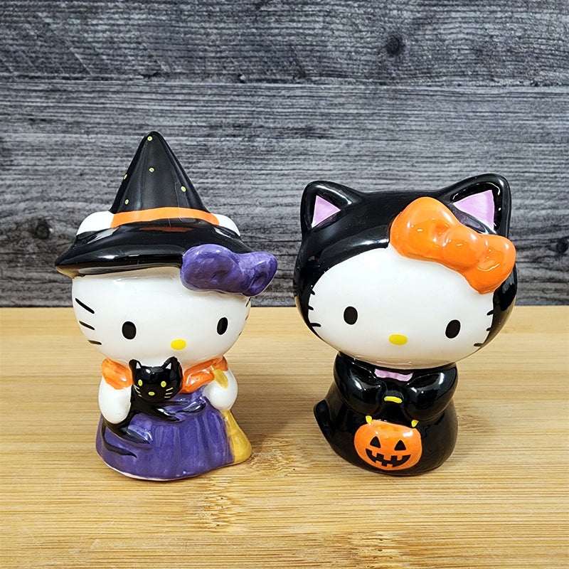Load image into Gallery viewer, Hello Kitty Halloween Trick Treat Witch Costume Salt Pepper Set Ceramic Blue Sky
