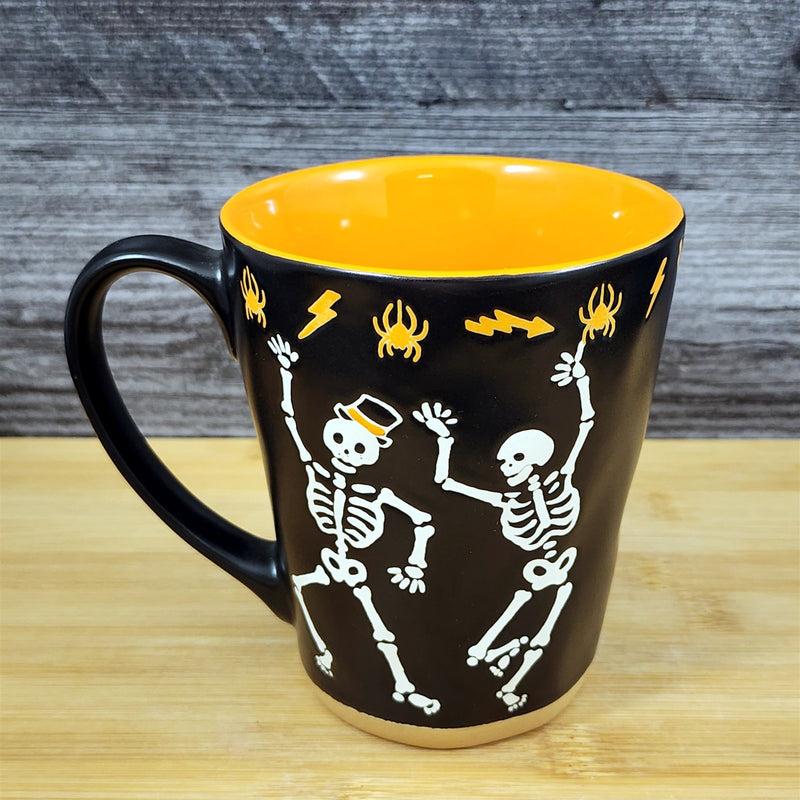 Load image into Gallery viewer, Halloween Dancing Skeleton Bones Orange Coffee Mug Ceramic Tea Cup Blue Sky

