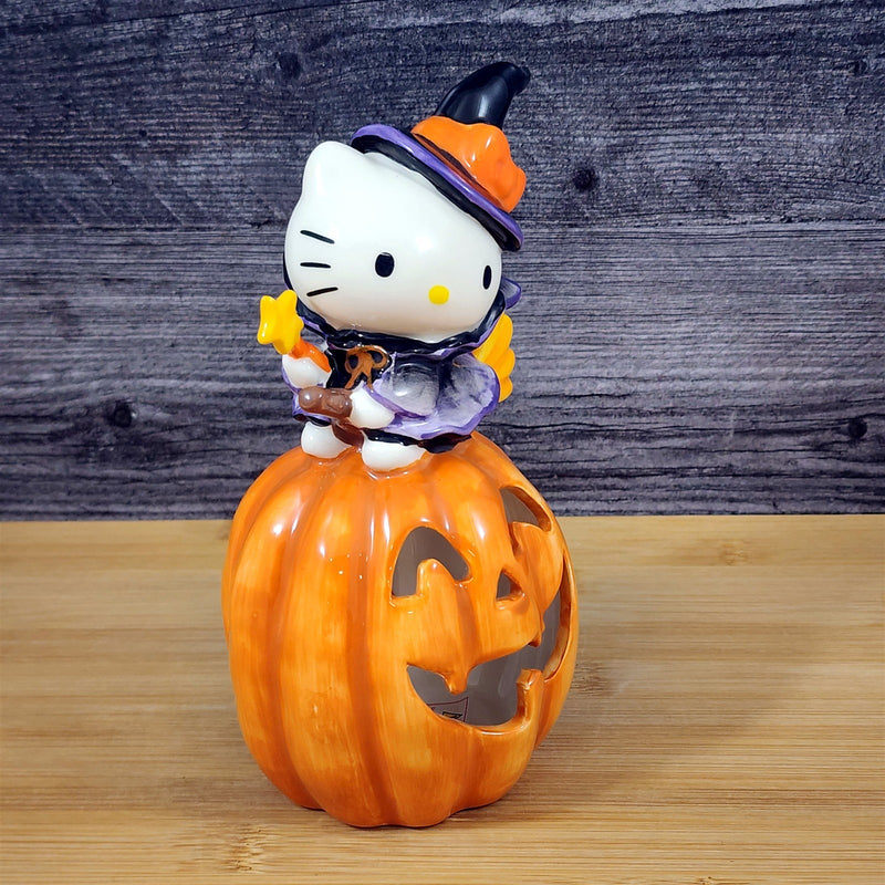 Load image into Gallery viewer, Hello Kitty Halloween Witch Tealight Candle House Ceramic Pumpkin Blue Sky
