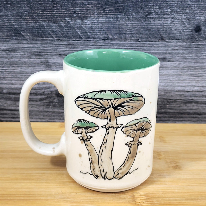Load image into Gallery viewer, Mushroom Toadstool Coffee Mug Tea Cup Blue Sky Green Ceramic Embossed Botanical
