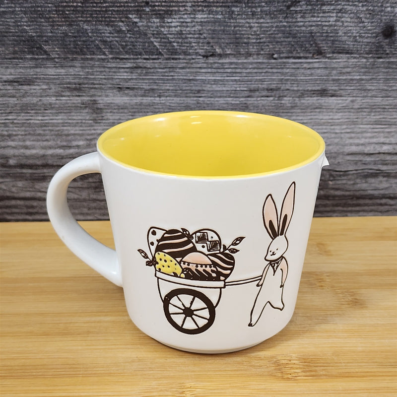 Load image into Gallery viewer, Easter Basket Coffee Mug Bunny and Cart Ceramic Tea Cup Yellow Blue Sky 14oz
