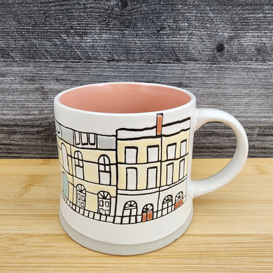 Whimsical Cityscape Coffee Mug Pastel Design Pink Interior Pottery Cup Blue Sky