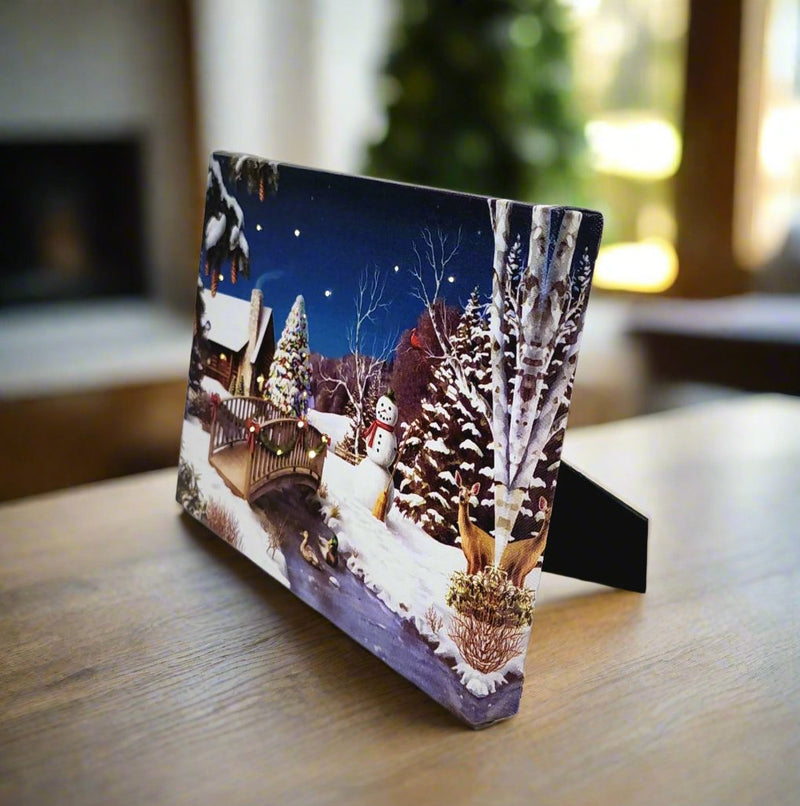 Load image into Gallery viewer, LED Lit Winter Scene with Snowman lighted Canvas Wall or Tabletop Picture Art
