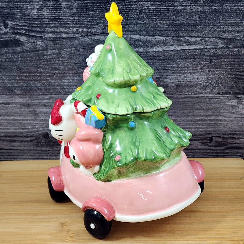 Load image into Gallery viewer, Hello Kitty My Melody Cookie Jar Joy Ride Car Christmas Tree Blue Sky Ceramic
