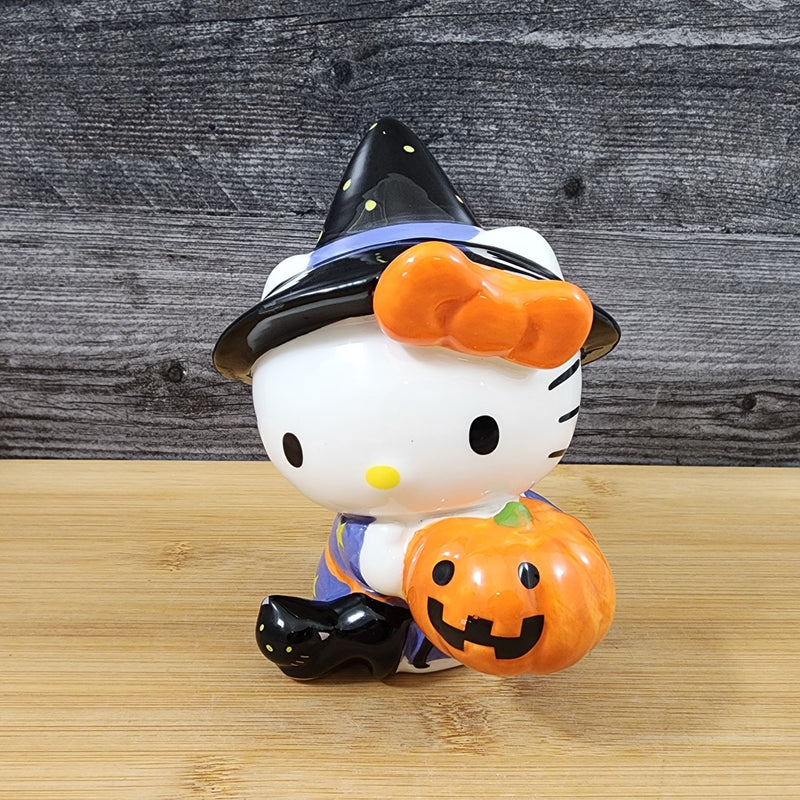 Load image into Gallery viewer, Hello Kitty in Halloween Costumes Witch Pumpkin Figurine Décor Ceramic Blue Sky
