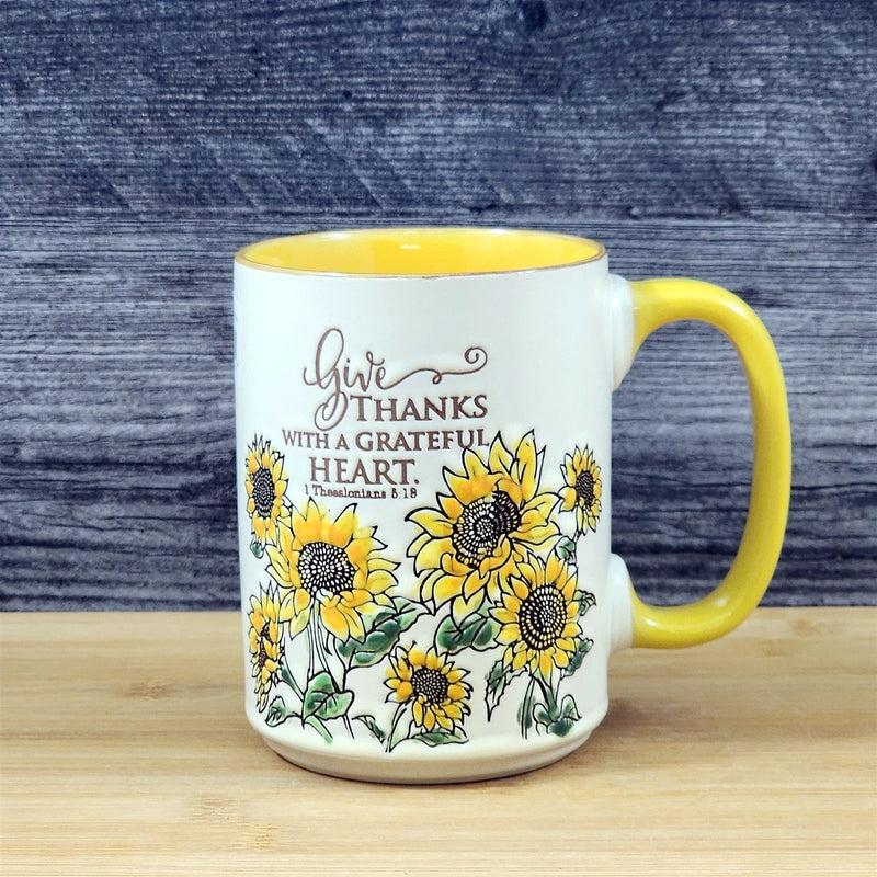 Load image into Gallery viewer, Religious Coffee Mug Thessalonians 5:18 &amp; Sunflower Embossed 18 oz Cup Blue Sky
