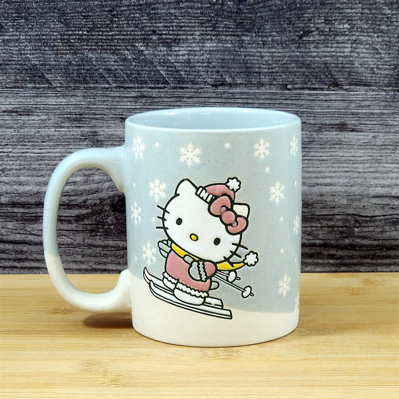 Load image into Gallery viewer, Hello Kitty Downhill Skiing Coffee Mug Ceramic Tea Cup Blue Sky Embossed 18oz
