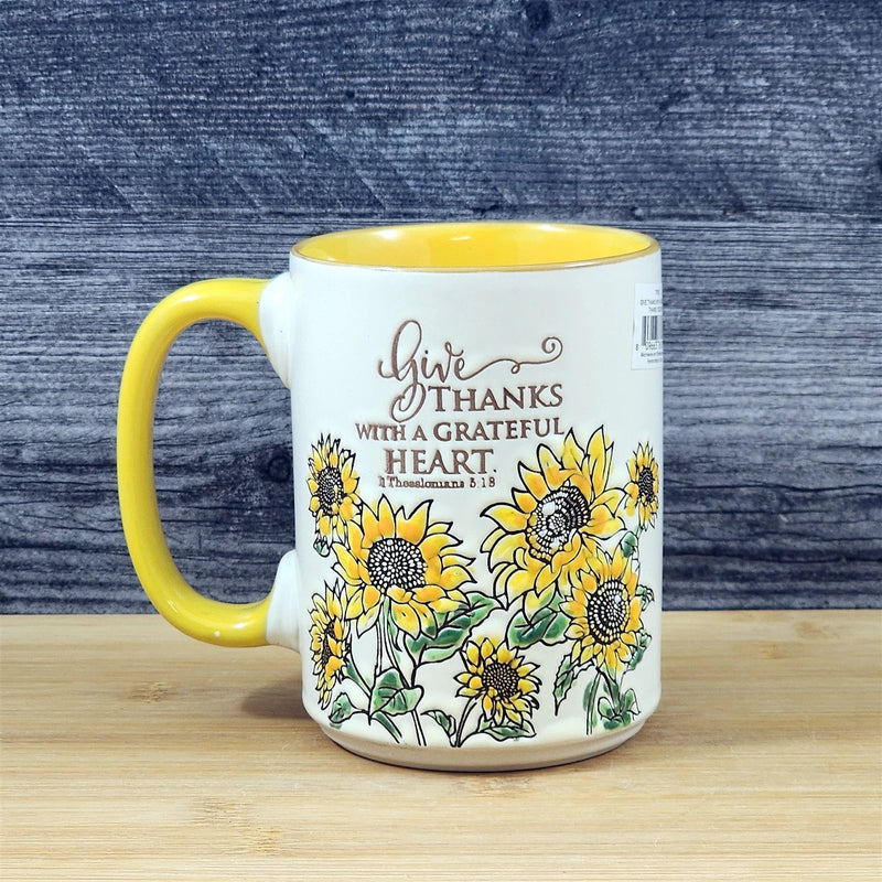 Load image into Gallery viewer, Religious Coffee Mug Thessalonians 5:18 &amp; Sunflower Embossed 18 oz Cup Blue Sky
