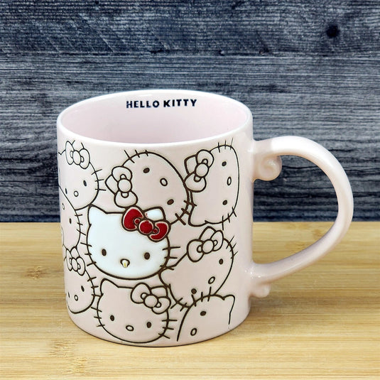 Hello Kitty Coffee Mug Pink Tea Cup Ceramic by Blue Sky Embossed 21oz