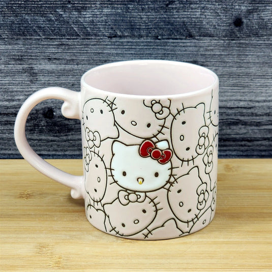 Hello Kitty Coffee Mug Pink Tea Cup Ceramic by Blue Sky Embossed 21oz