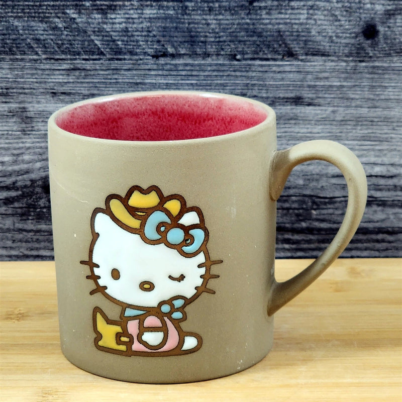 Load image into Gallery viewer, Hello Kitty Cowgirl Brown Coffee Mug Embossed Ceramic Tea Cup Blue Sky 18oz
