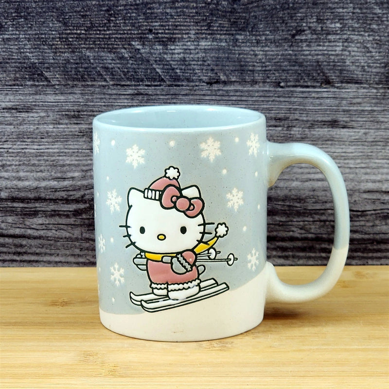 Load image into Gallery viewer, Hello Kitty Downhill Skiing Coffee Mug Ceramic Tea Cup Blue Sky Embossed 18oz

