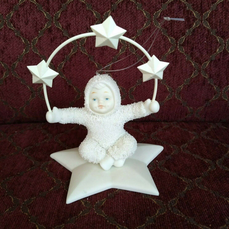 Load image into Gallery viewer, Snowbabies by Department 56 68675 Juggling Stars in the Sky Bisque Ornament
