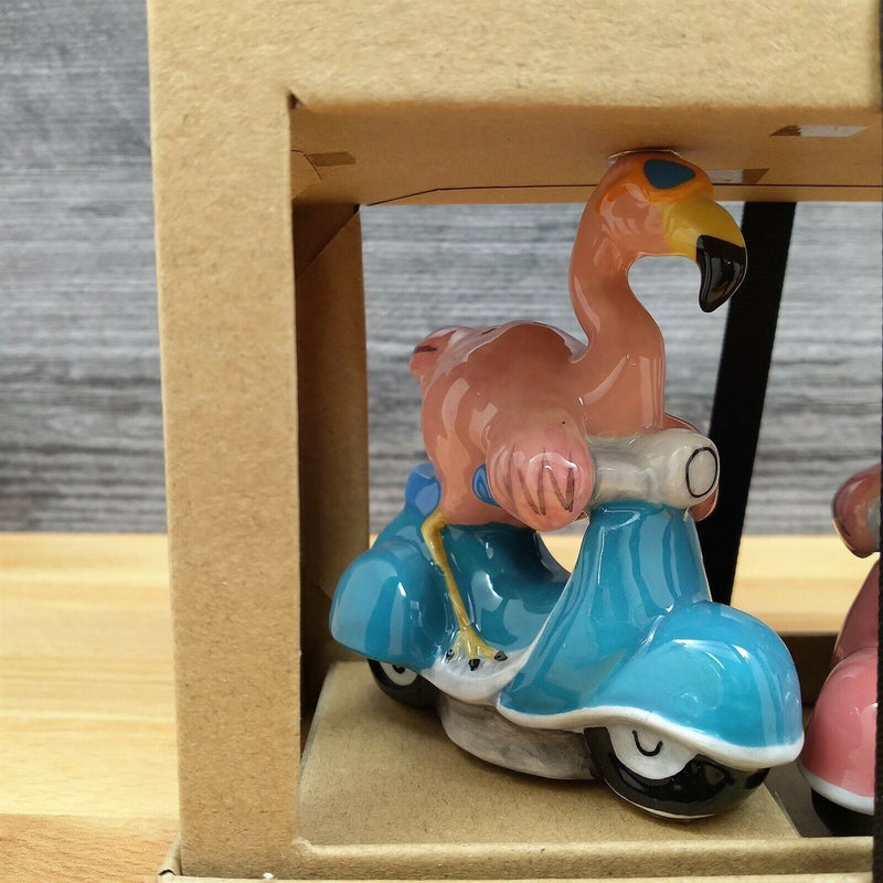 Load image into Gallery viewer, Pink Flamingos on Scooters Salt Pepper Set Collectible by Blue Sky Clayworks
