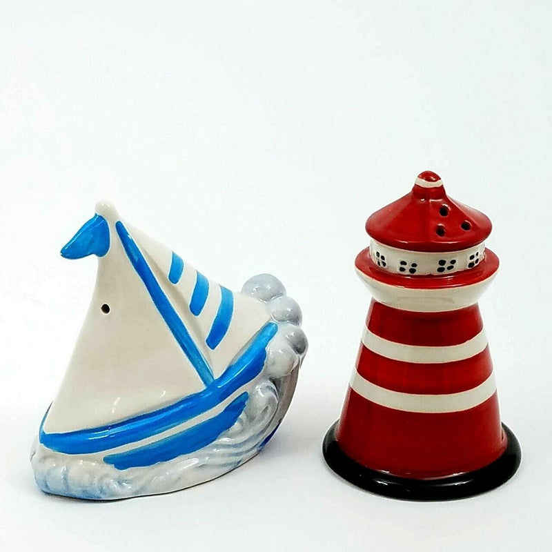 Load image into Gallery viewer, Salt and Pepper Shaker Set Sail Boat Light House Collectible Decorative Goldminc
