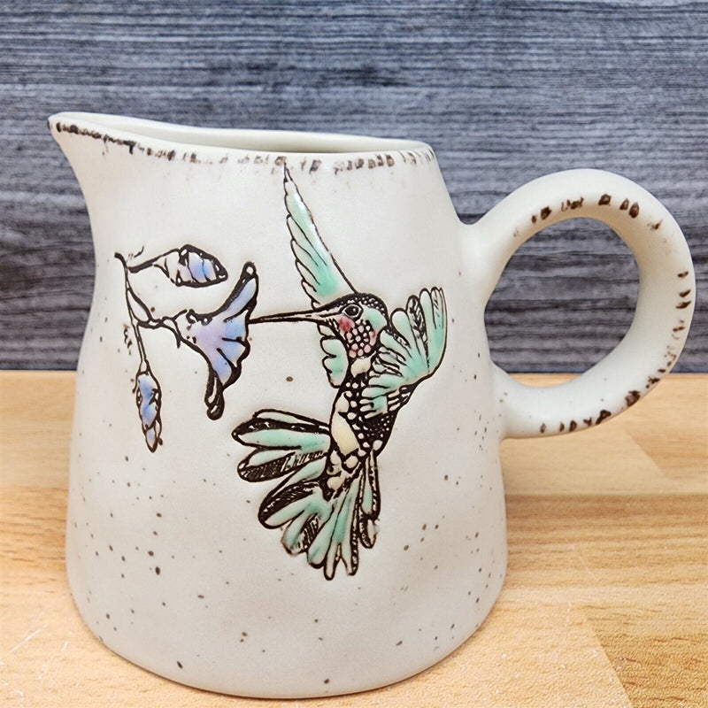 Load image into Gallery viewer, Hummingbird with Flowers Creamer Embossed by Blue Sky Clayworks

