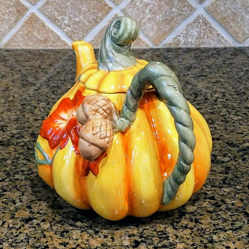 Load image into Gallery viewer, Ceramic Pumpkin Halloween Teapot orange with green floral leaves
